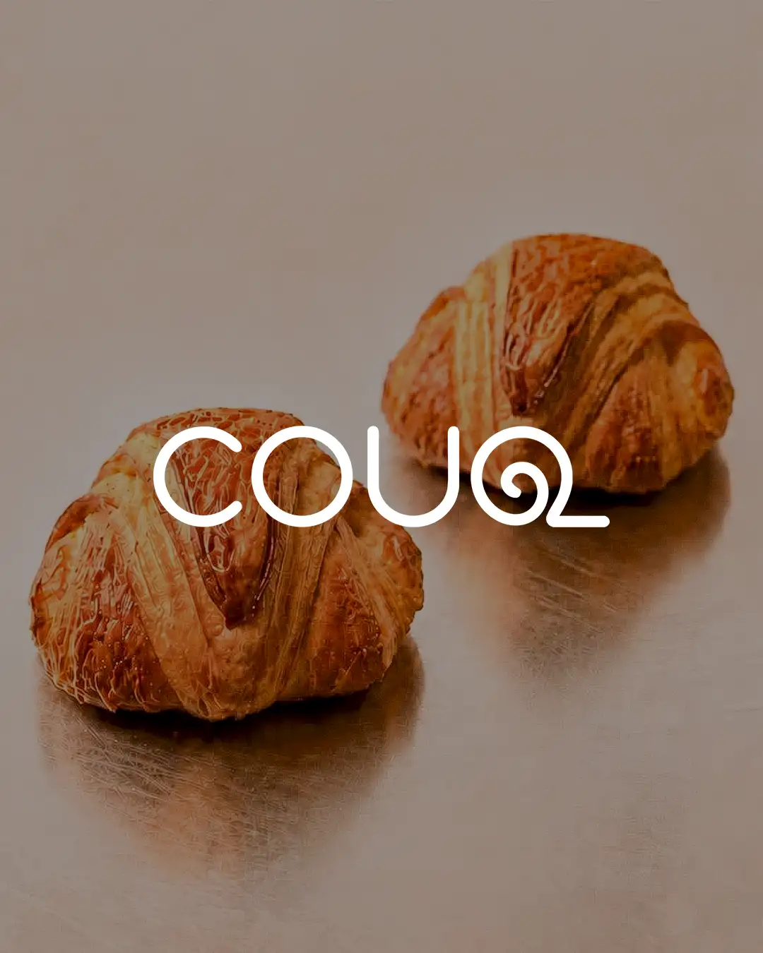 Bread and croissant from Couq at Marché Saint-Géry